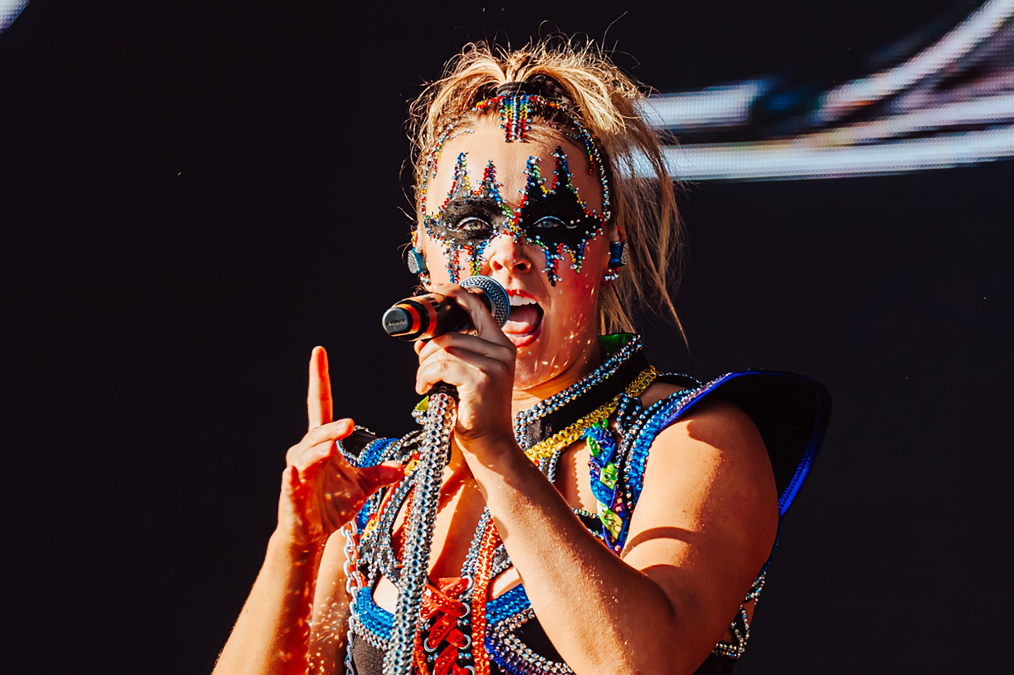 <p>Reality star JoJo Siwa, in her new, Gene Simmons-inspired get-up, on the main stage at Mighty Hoopla</p>